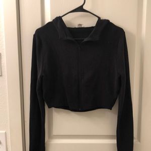 Black forever 21 athletic cropped sweatshirt. Never worn. Size large.
